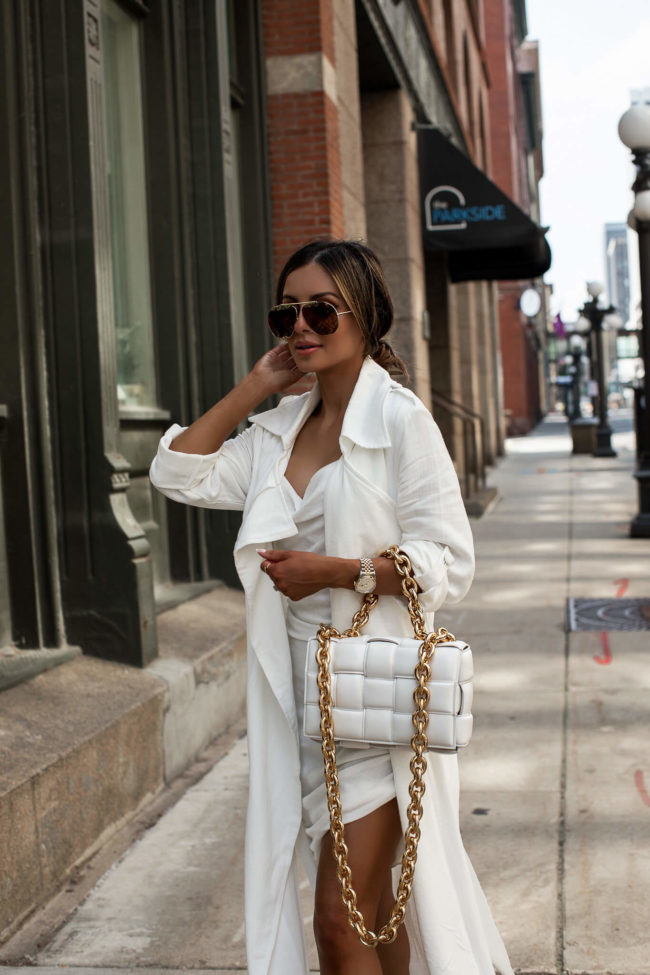 fashion blogger wearing an all white outfit for summer