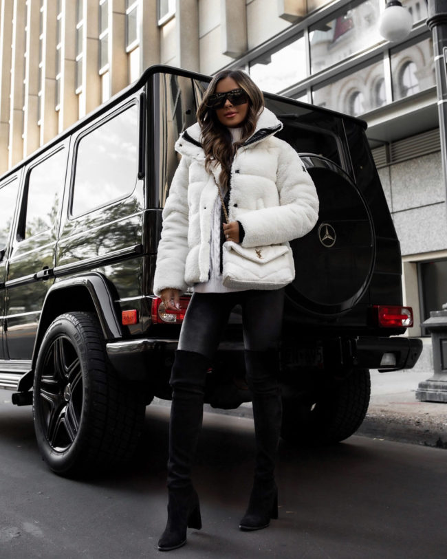 fashion blogger wearing a winter outfit from saks fifth avenue