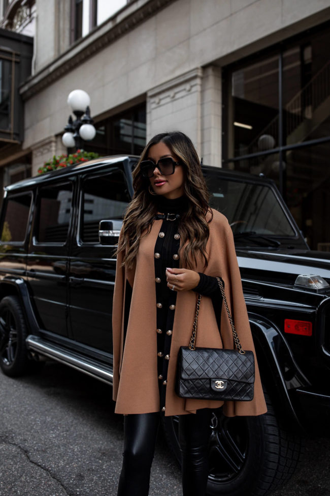 fashion blogger wearing a camel cape for fall