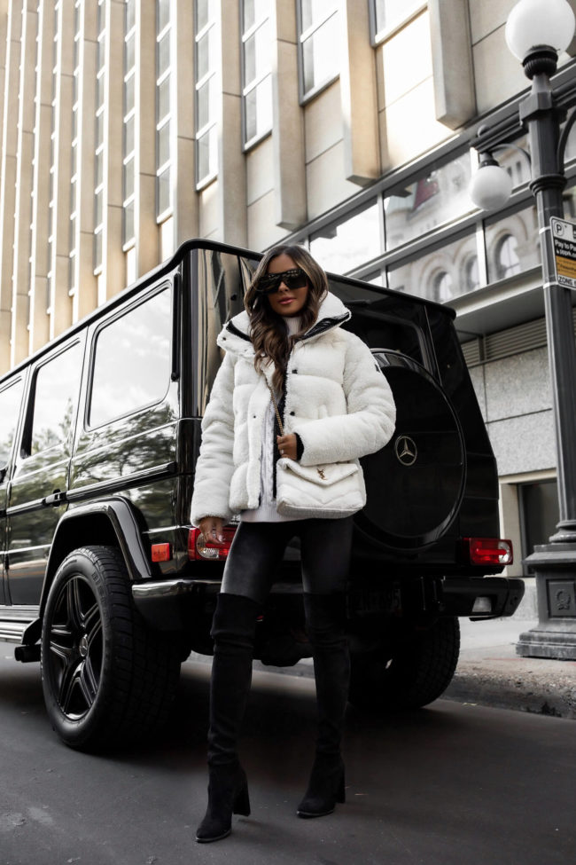 fashion blogger wearing a winter outfit from saks fifth avenue