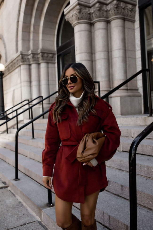 fashion blogger wearing a red shacket from walmart