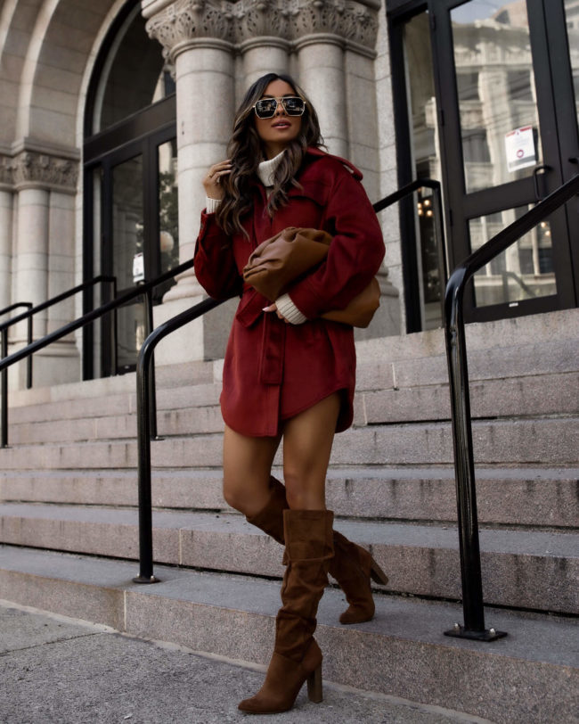 fashion blogger wearing a shacket from walmart and suede boots