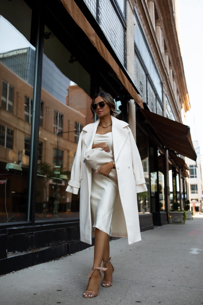 fashion blogger wearing a chic all white outfit from express