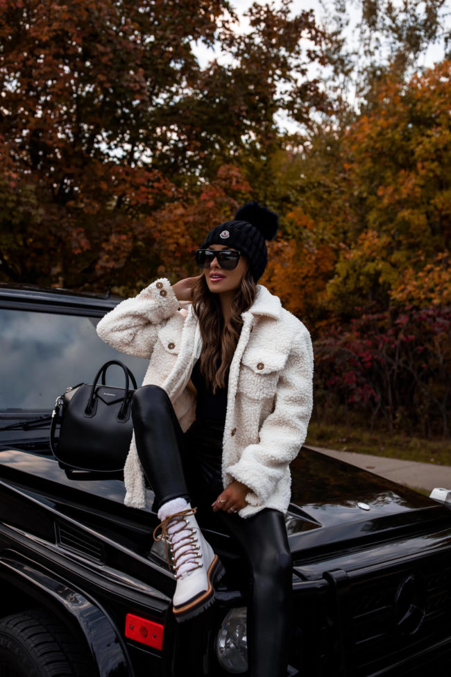 fashion blogger wearing white shearling marc fisher boots from nordstrom for fall