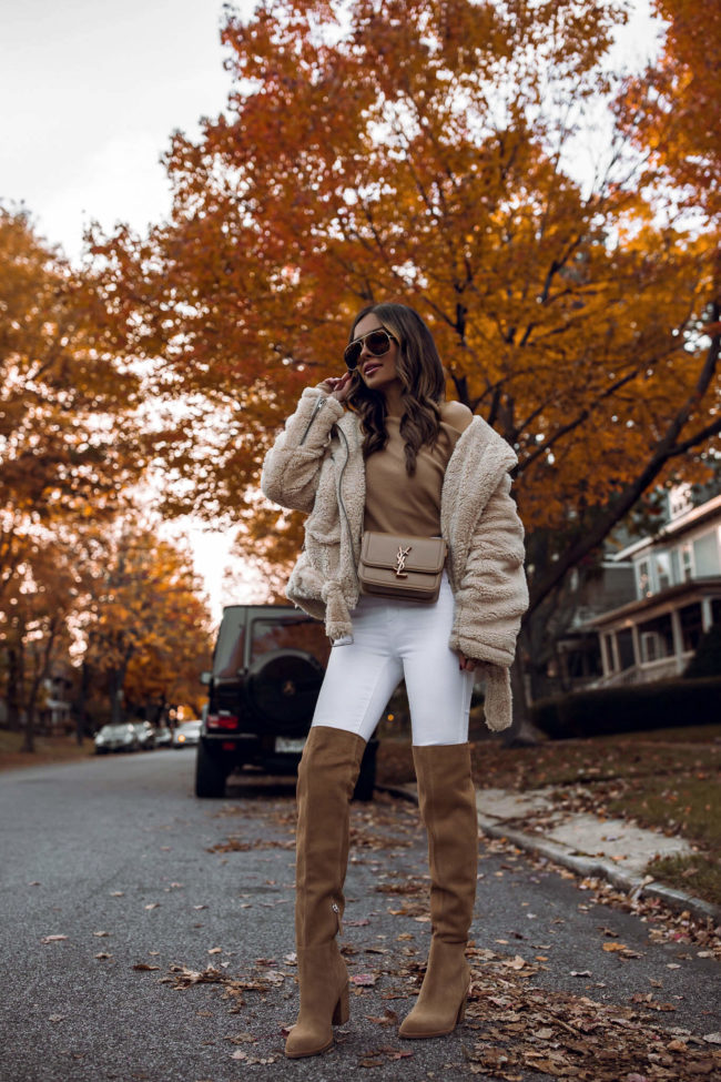 fashion blogger mia mia mine wearing a camel top and white denim from nordstrom