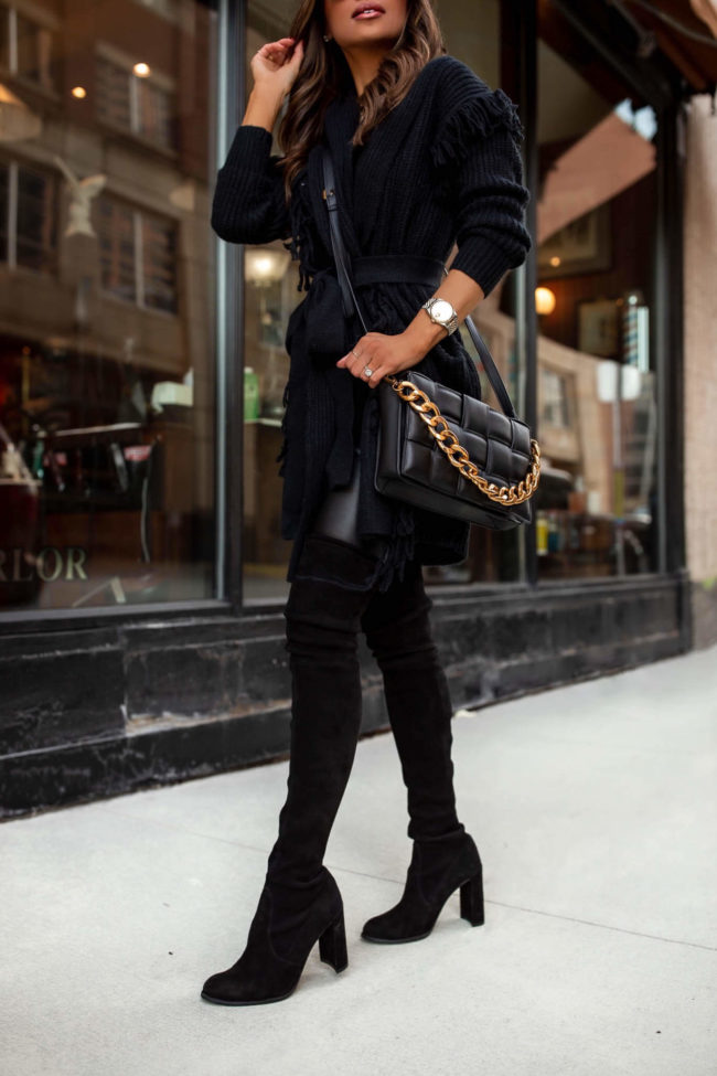 fashion blogger wearing over the knee boots from walmart