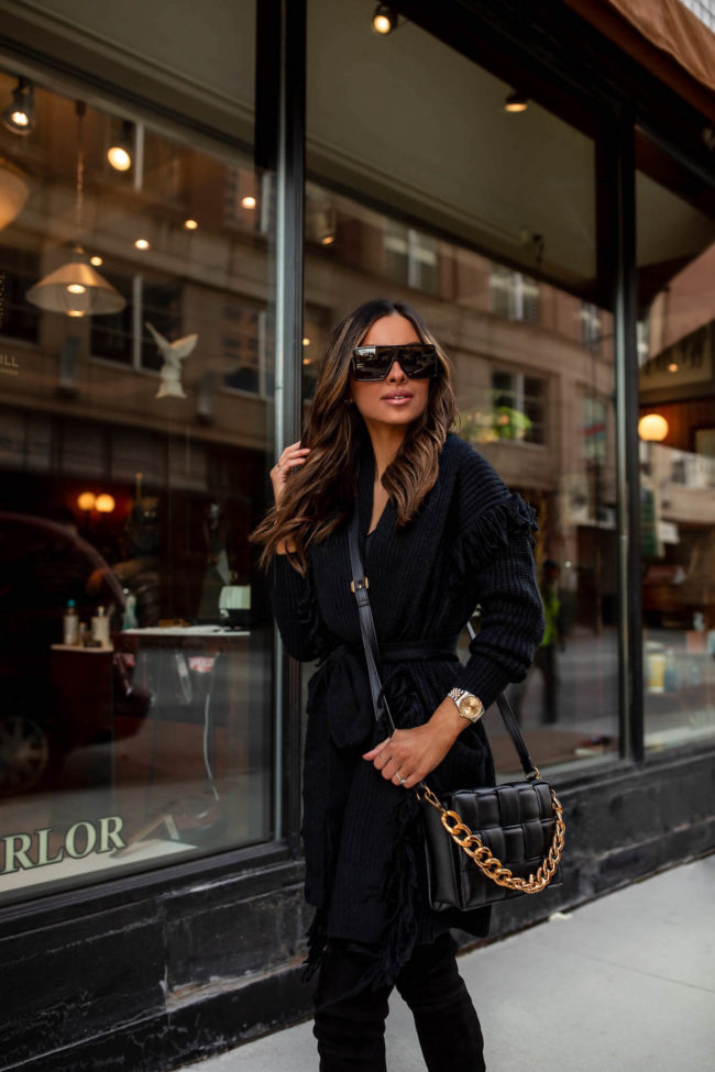 fashion blogger wearing a fringe cardigan by scoop from walmart