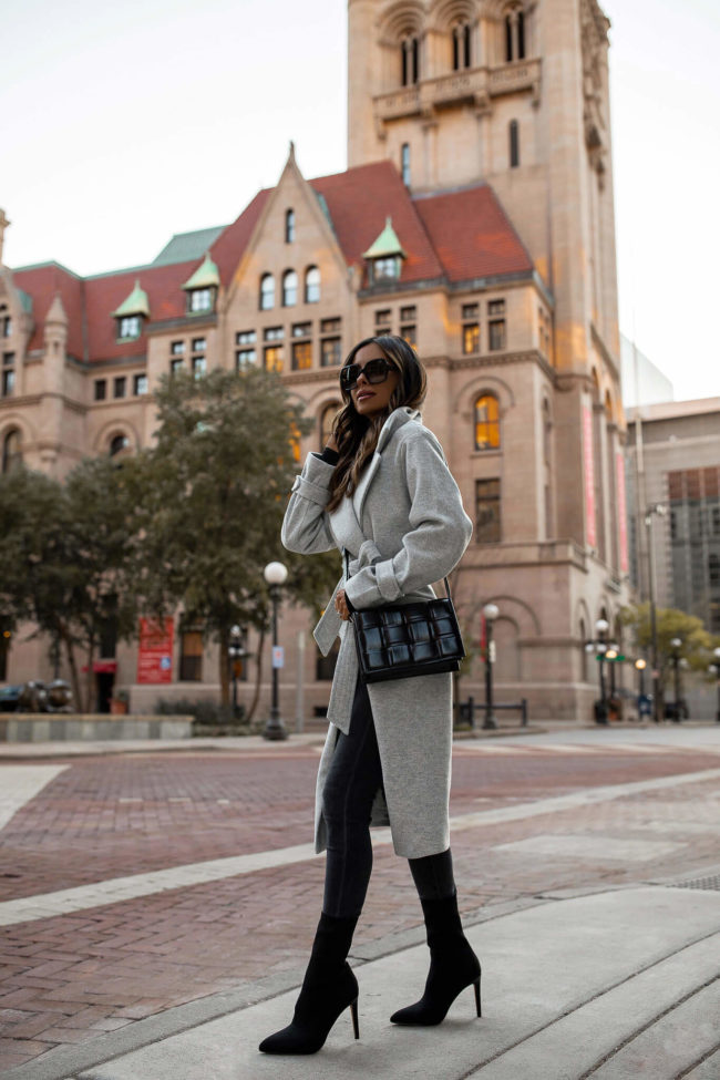 fashion blogger wearing a gray fall outfit