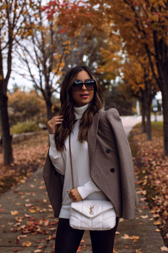 fashion blogger wearing a fall outfit from saks