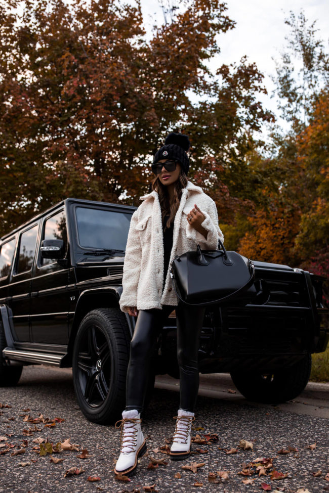 fashion blogger mia mia mine wearing a white shearling jacket from nordstrom