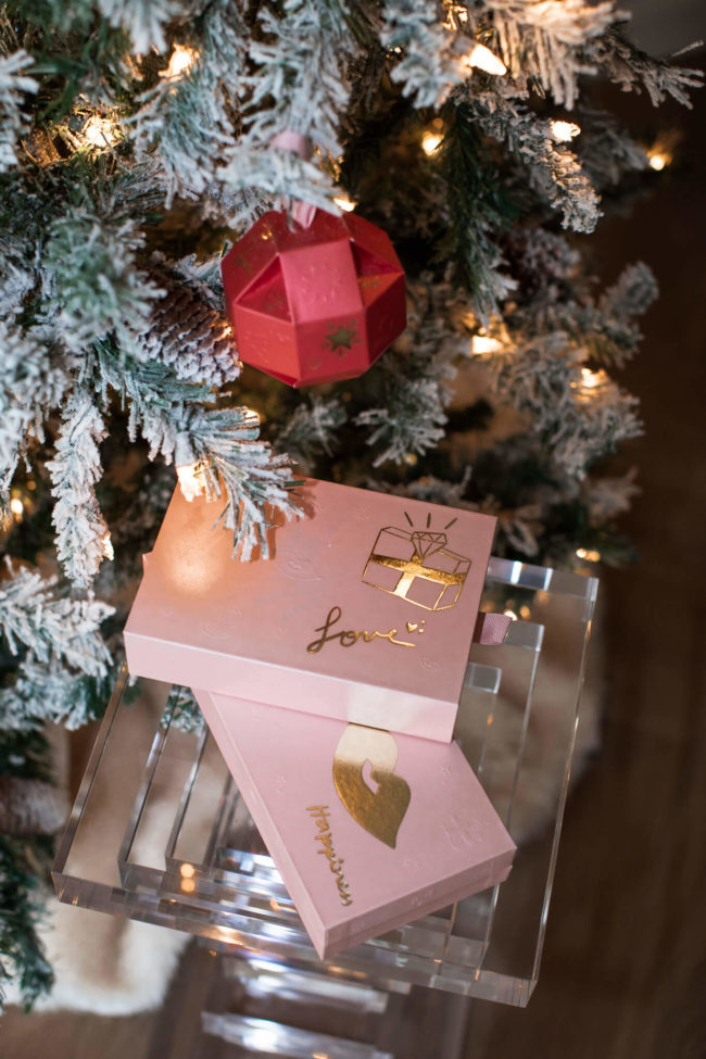 holiday gifts under the tree from beauty pie