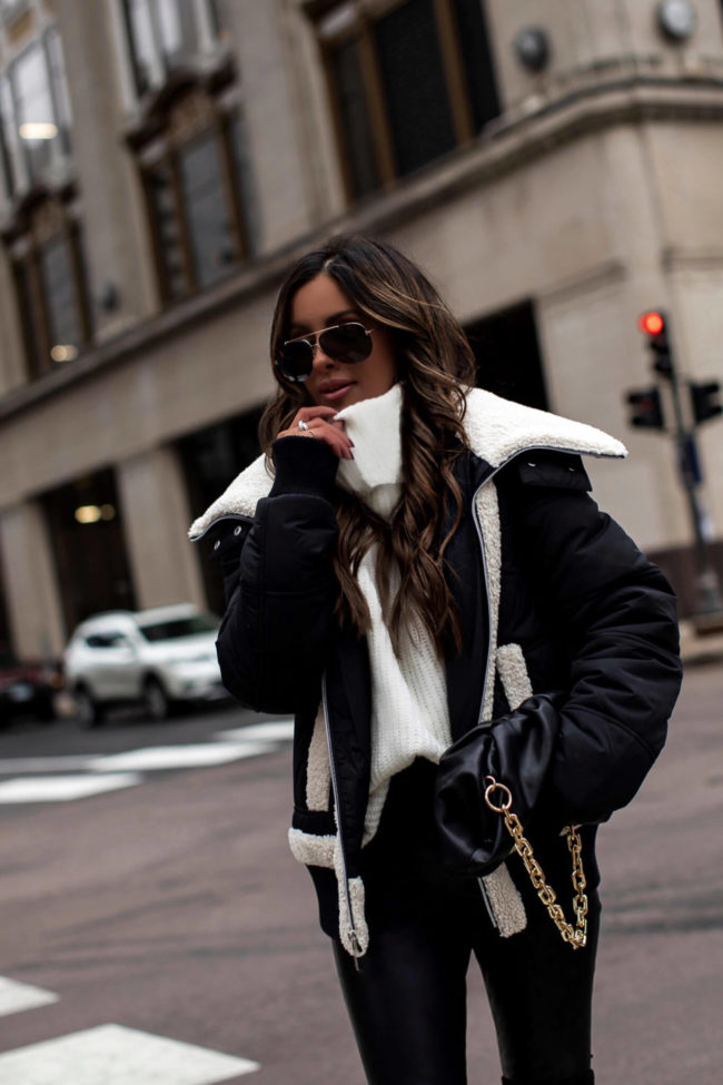 fashion blogger mia mia mine wearing a shearling jacket from walmart for fall