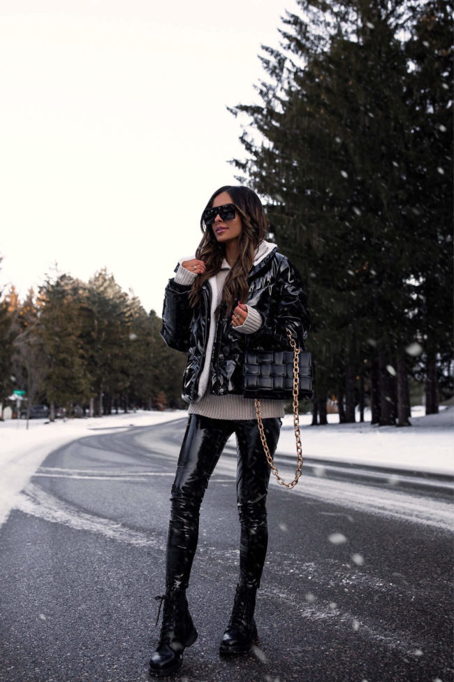 fashion blogger mia mia mine wearing a puffer jacket and combat boots from walmart