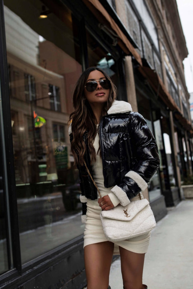 fashion blogger wearing a puffer jacket from express for winter