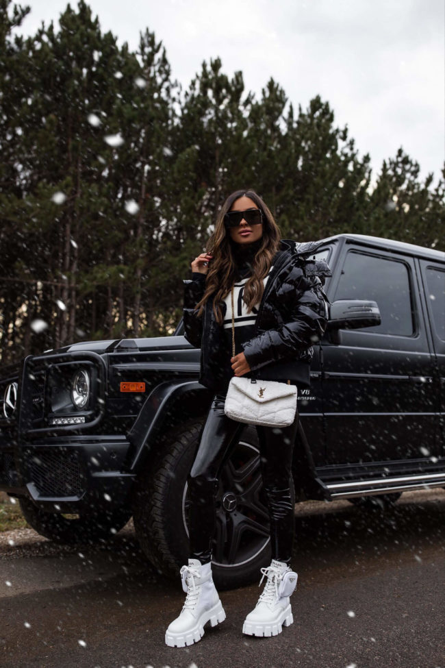 fashion blogger mia mia mine wearing a perfect moment ski sweater