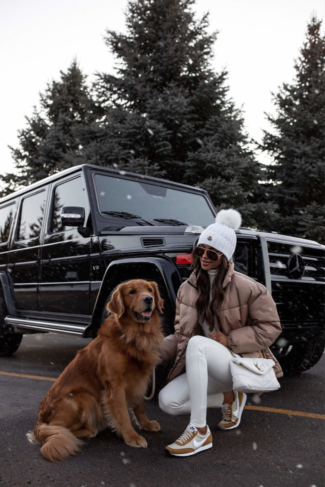 fashion blogger wearing a white outfit from nordstrom and a puffer jacket