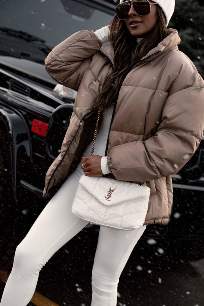 fashion blogger mia mia mine wearing a saint laurent boucle bag