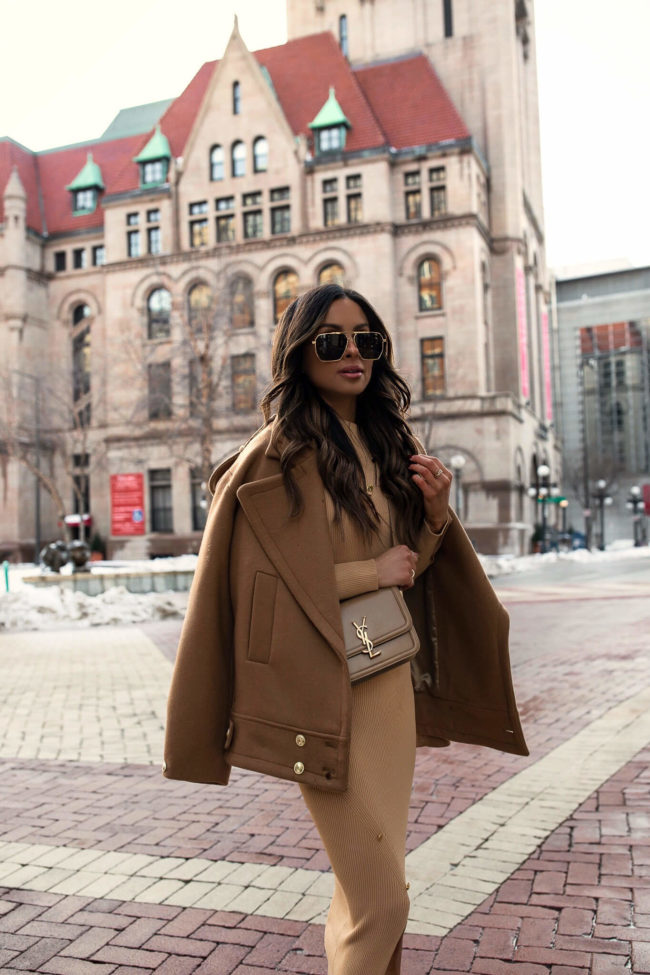 fashion blogger wearing a camel jacket and camel dress from karen millen