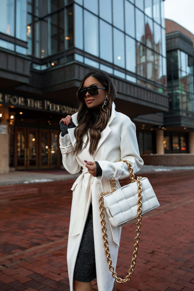 fashion blogger wearing a white coat from express for winter