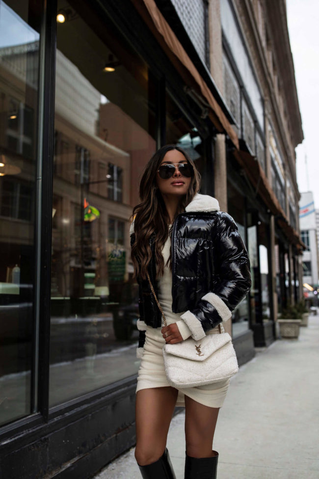 fashion blogger wearing a puffer jacket from express for winter