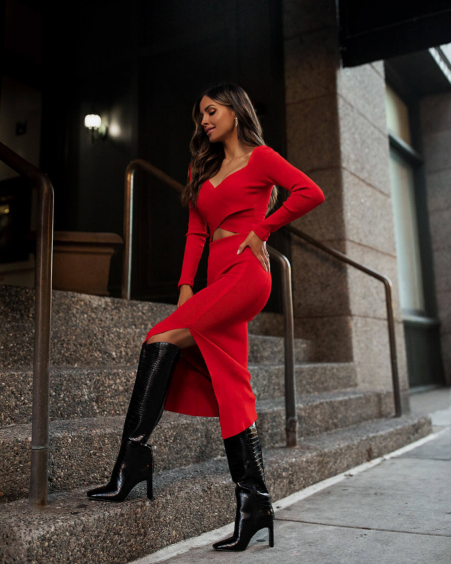 fashion blogger wearing a red matching knit set from express