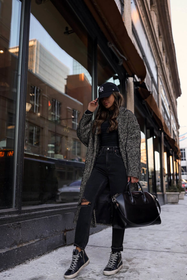 fashion blogger mia mia mine wearing a wool coat from abercrombie and golden goose sneakers