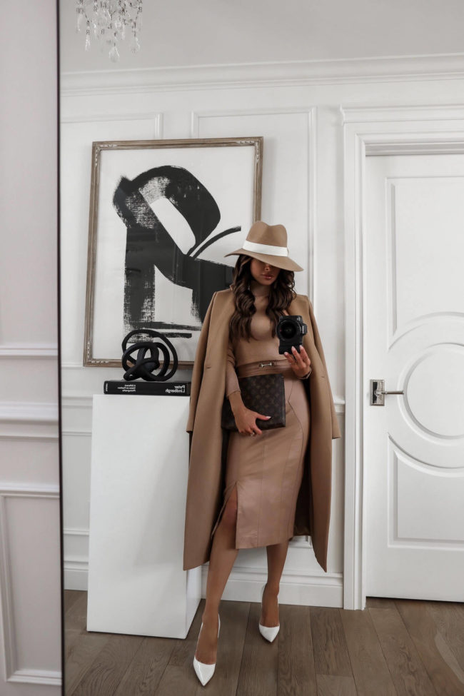fashion blogger mia mia mine wearing a camel skirt and camel coat from karen millen