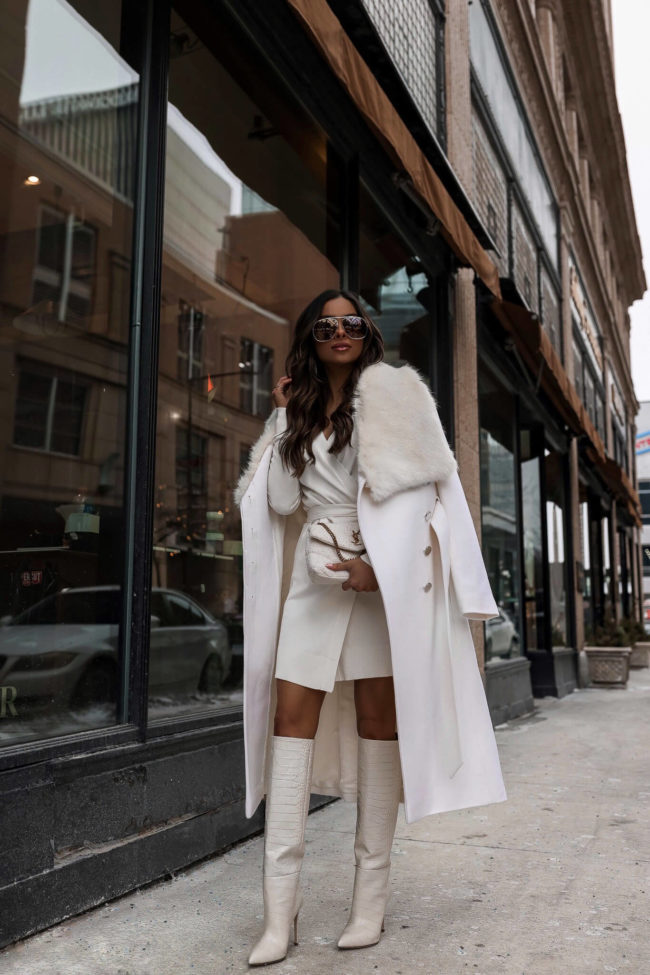 fashion blogger mia mia mine wearing a white faux fur coat from karen millen