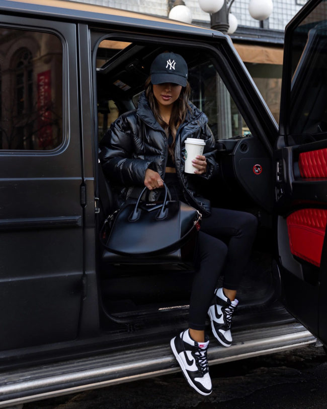 fashion blogger mia mia mine wearing nike dunk high sneakers