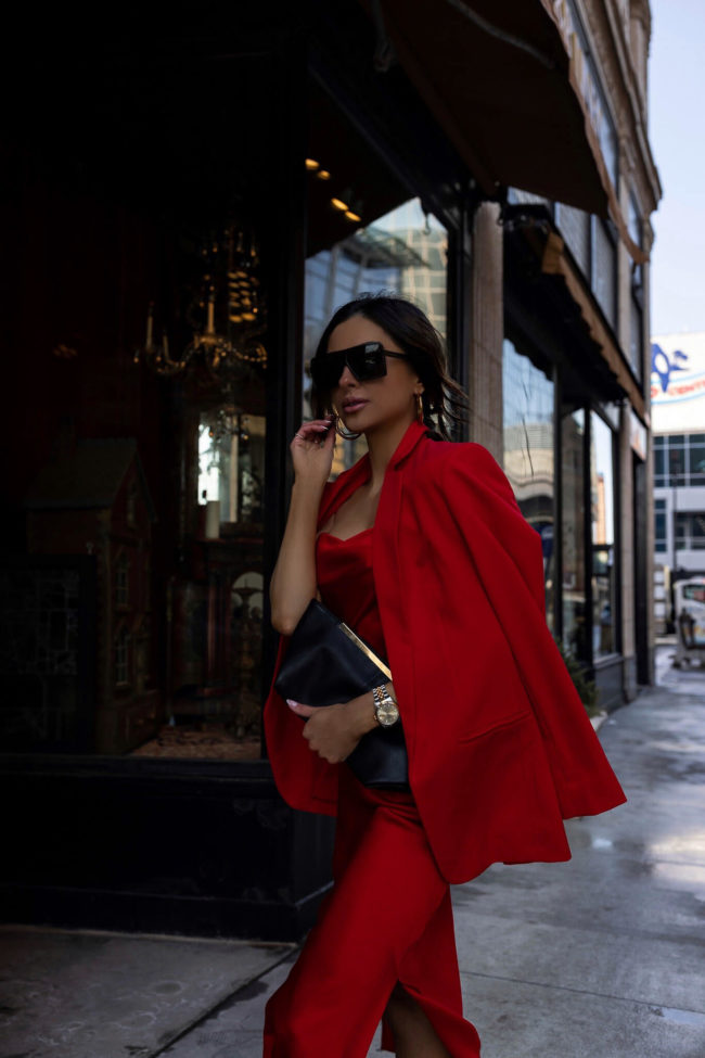fashion blogger wearing a red outfit from express