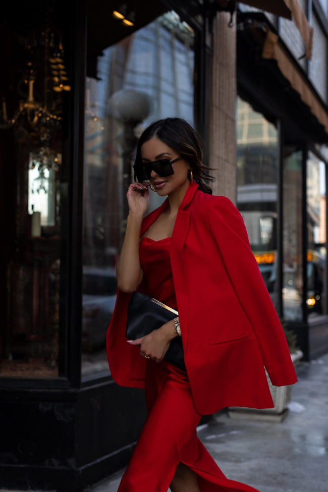 fashion blogger mia mia mine wearing a red outfit for valentine's day from express