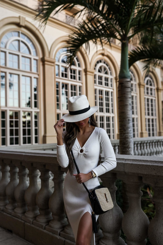 fashion blogger mia mia mine wearing a white knit dress from abercrombie