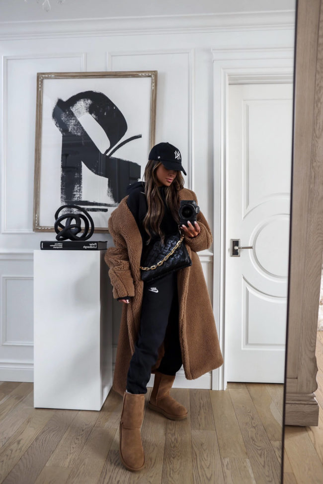 fashion blogger wearing ugg boots and a max mara coat