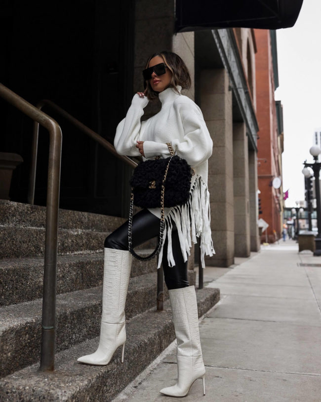 fashion blogger wearing white paris texas boots from farfetch