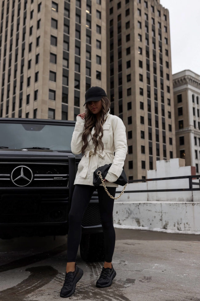 fashion blogger wearing black leggings and sneakers from walmart