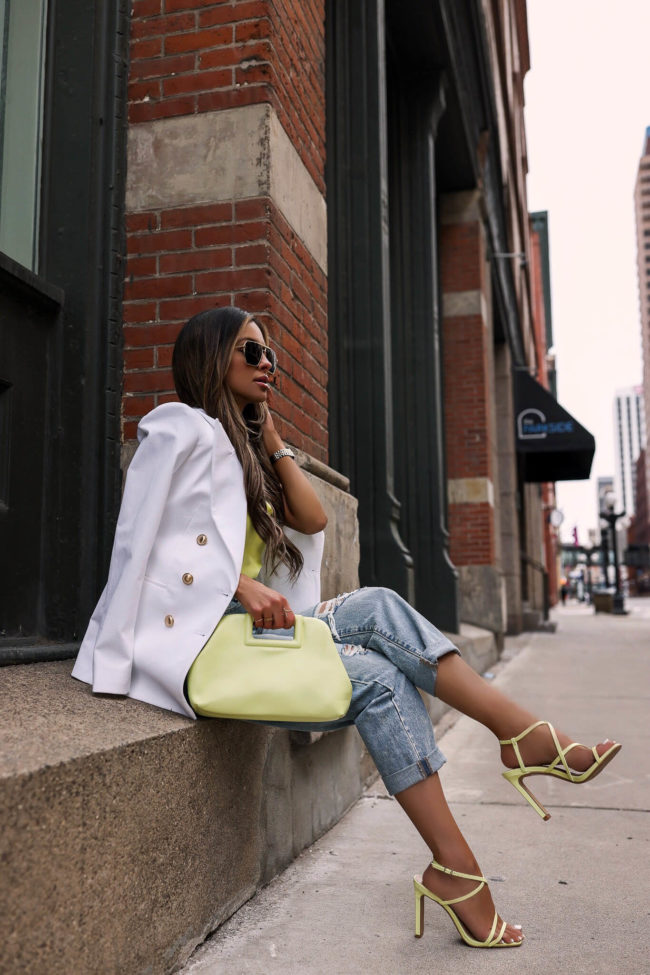 fashion blogger mia mia mine wearing neon heels from express