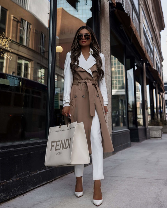 fashion blogger mia mia mine wearing a camel and white trench coat from karen millen