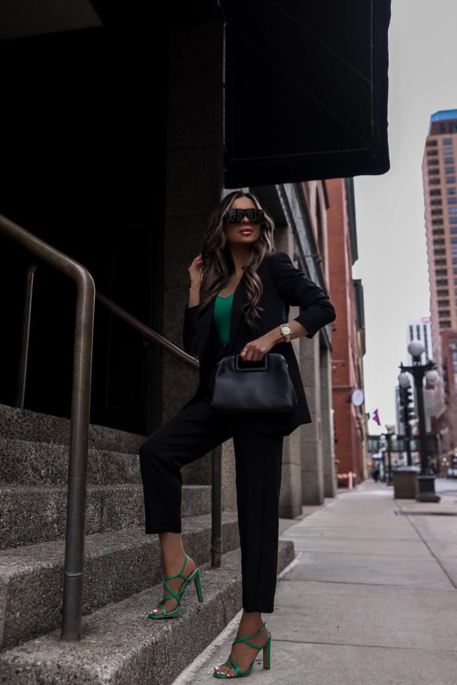 fashion blogger mia mia mine wearing green heels from express