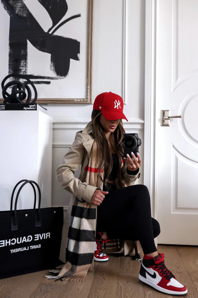 fashion blogger mia mia mine wearing red nike air jordan sneakers