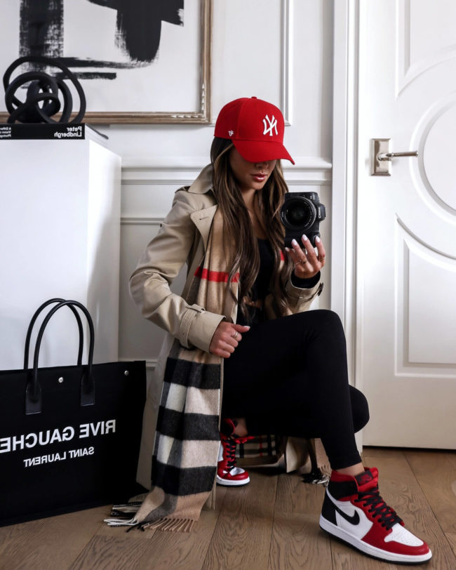 fashion blogger mia mia mine wearing red nike air jordan sneakers