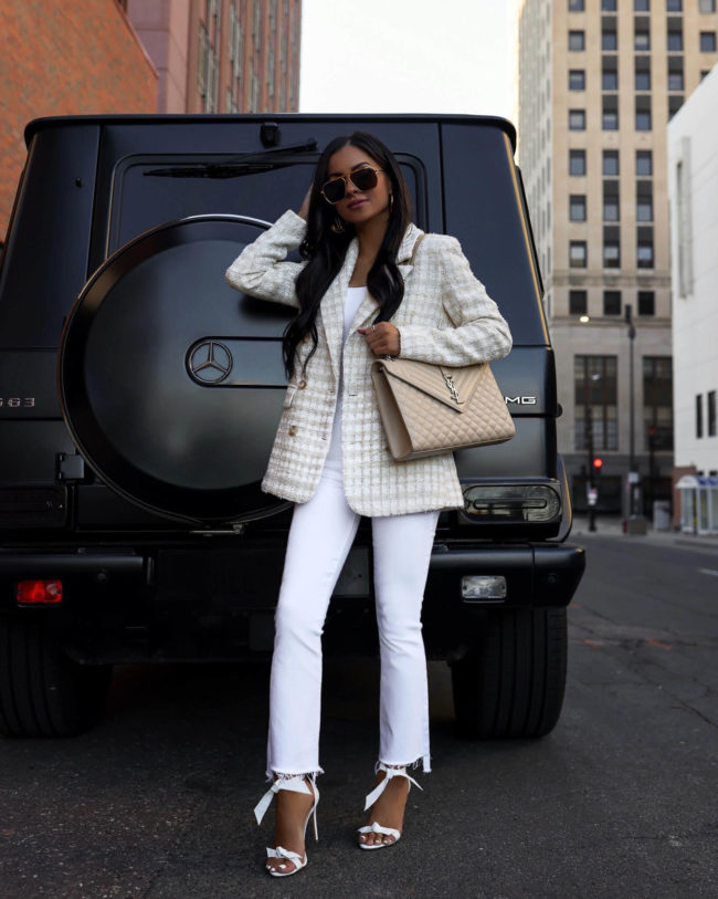 fashion blogger wearing white mother denim from bloomingdales