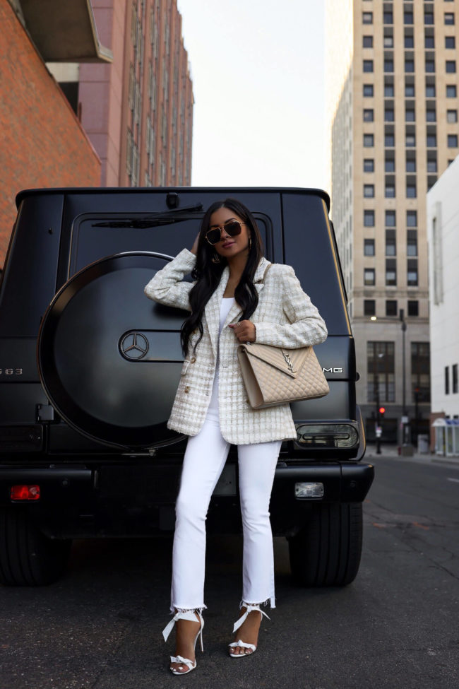 fashion blogger wearing white mother denim from bloomingdales