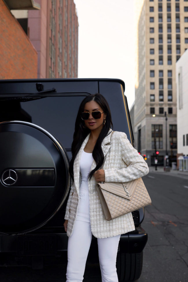 fashion blogger wearing an ivory tweed blazer from bloomingdales