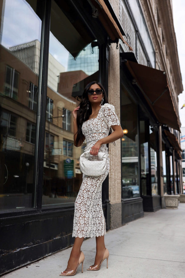 fashion blogger mia mia mine wearing a white self portrait dress from mytheresa