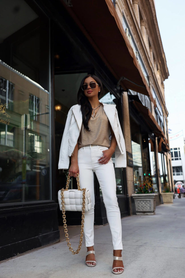 fashion blogger mia mia mine wearing white coated denim from whbm