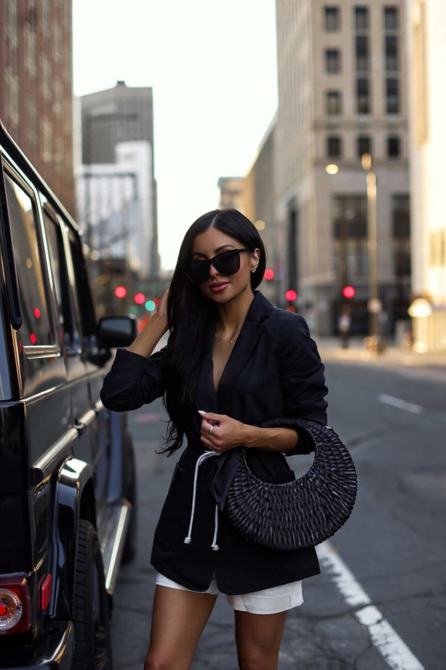 fashion blogger mia mia mine wearing a black linen free assembly blazer from walmart