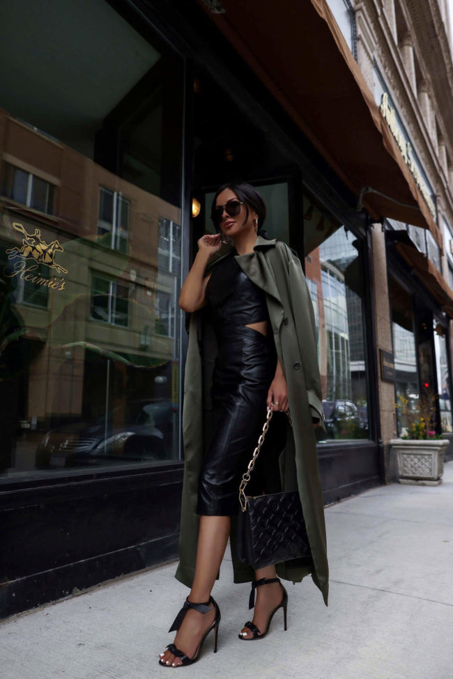 fashion blogger wearing an olive trench coat from karen millen