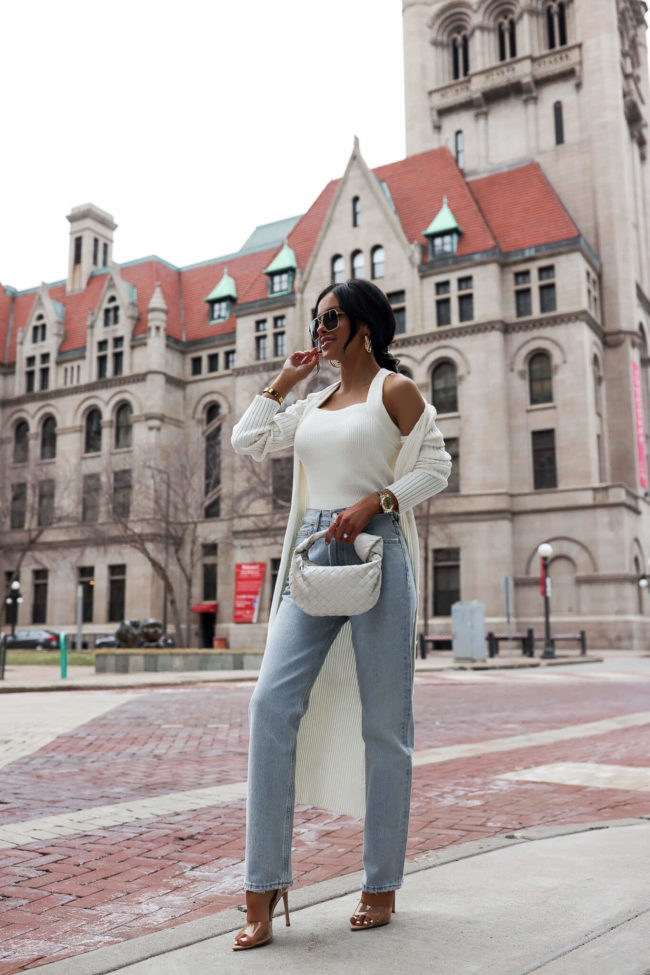 fashion blogger mia mia mine wearing agolde denim and a white knit set from revolve