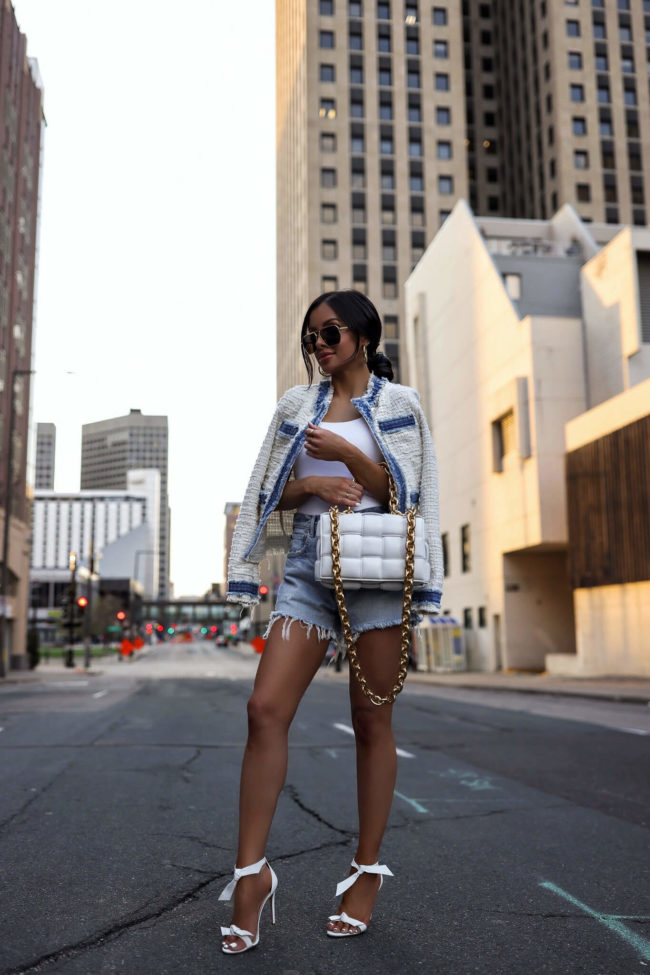 fashion blogger mia mia mine wearing moussy denim shorts from revolve