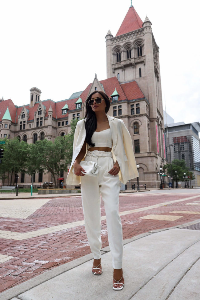 fashion blogger mia mia mine wearing a white set from express
